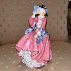 Royal Doulton "Top o' the Hill" bone china figurine, excellent condition.